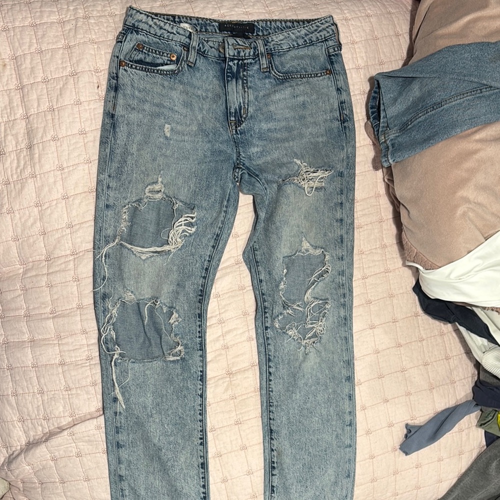 Distressed Blue Jeans